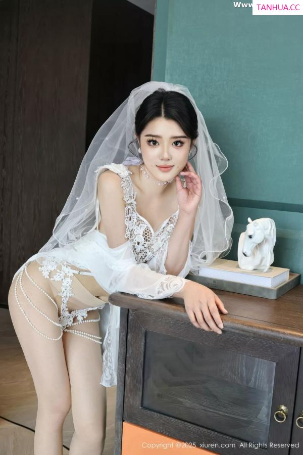   [XiuRen]高清写真图 2025.07.18 No.10559 糯梨子 白色婚纱第7张图片